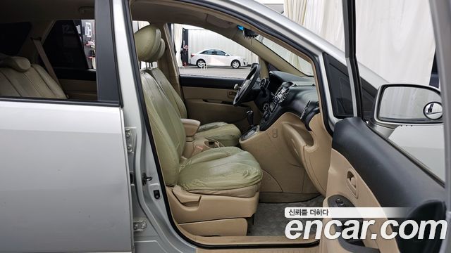 Kia Carens 2007 — photo 11