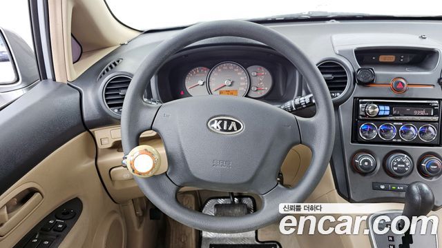 Kia Carens 2007 — photo 13