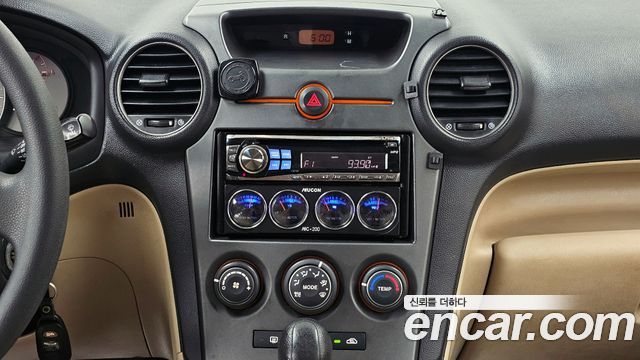 Kia Carens 2007 — photo 14