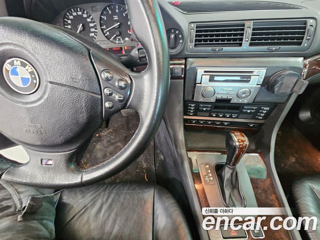 BMW 7-Series 1999 — photo 13