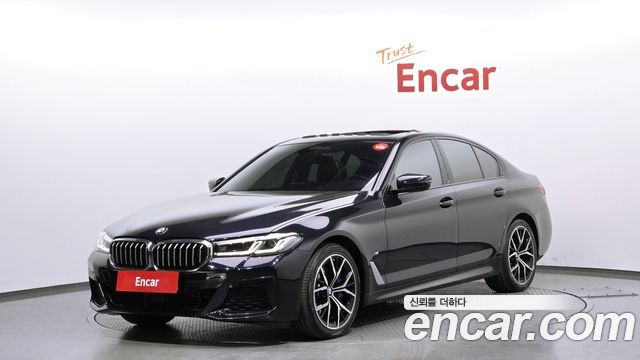 BMW 5-Series 2022 — photo 1