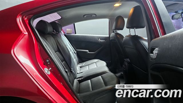 Kia K3 2015 — photo 11
