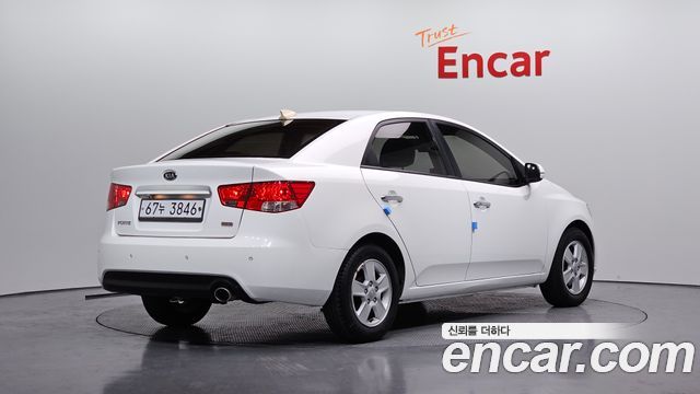 Kia Porte 2013 — photo 2
