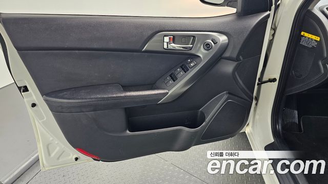 Kia Porte 2013 — photo 14