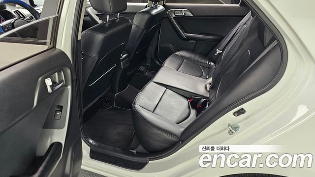 Kia Porte 2013 — photo 16