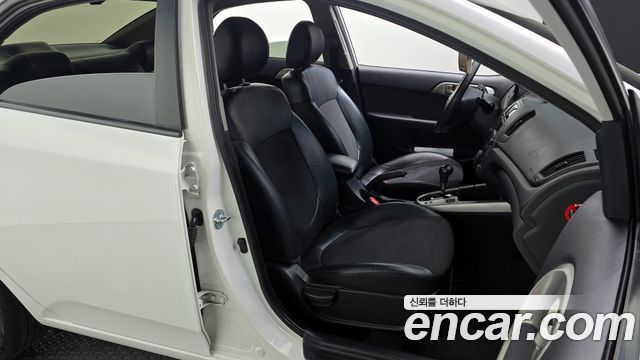 Kia Porte 2009 — photo 12