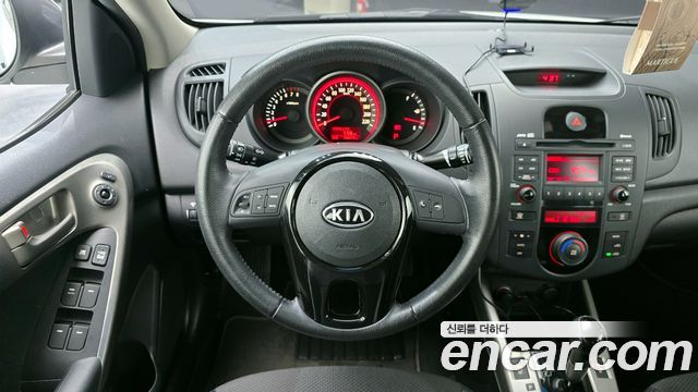 Kia Porte 2009 — photo 13