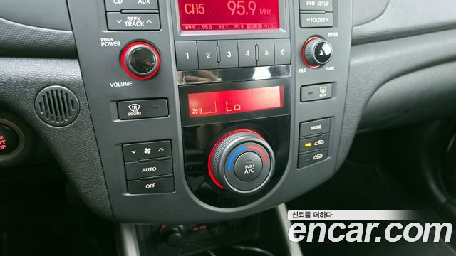 Kia Porte 2009 — photo 18