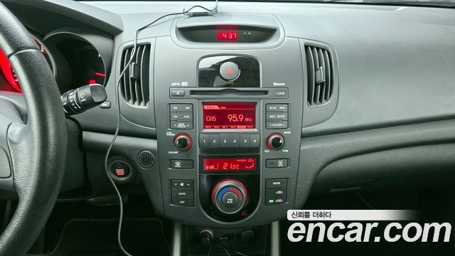 Kia Porte 2009 — photo 20