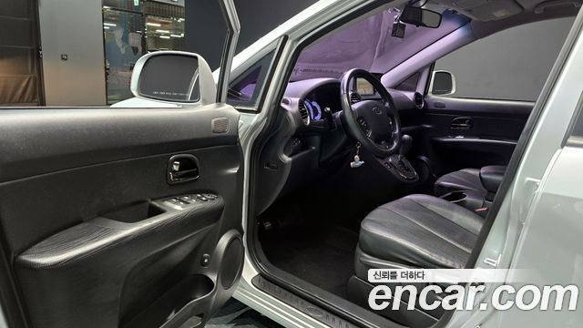 Kia Carens 2013 — photo 10