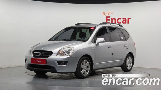 Kia Carens 2009 — photo 1