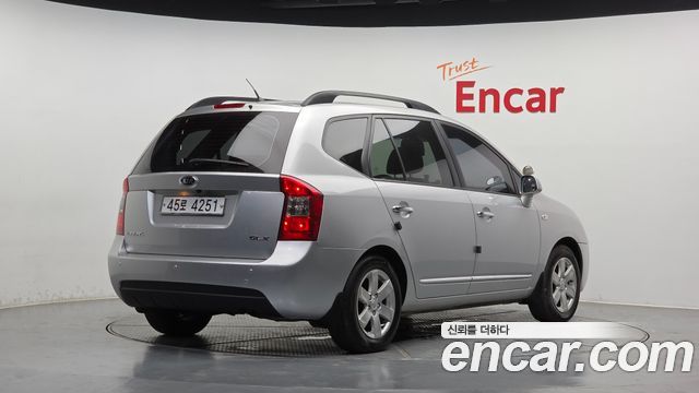 Kia Carens 2009 — photo 2