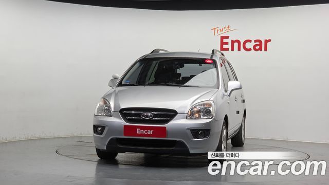Kia Carens 2009 — photo 3