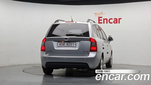 Kia Carens 2009 — photo 4