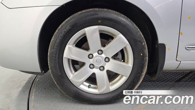 Kia Carens 2009 — photo 5