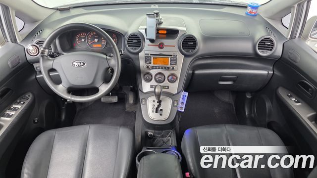 Kia Carens 2009 — photo 7