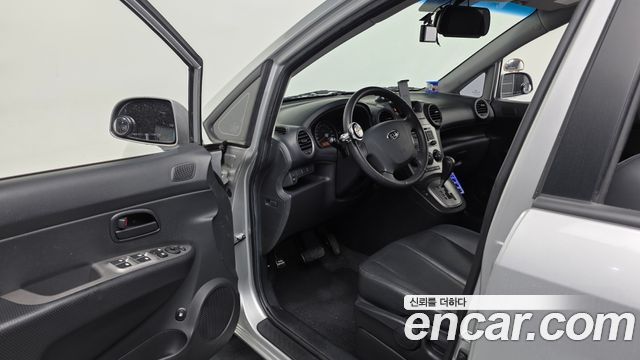 Kia Carens 2009 — photo 10