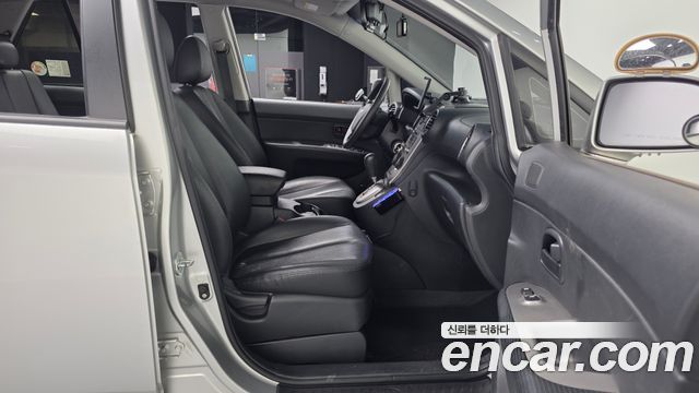 Kia Carens 2009 — photo 11