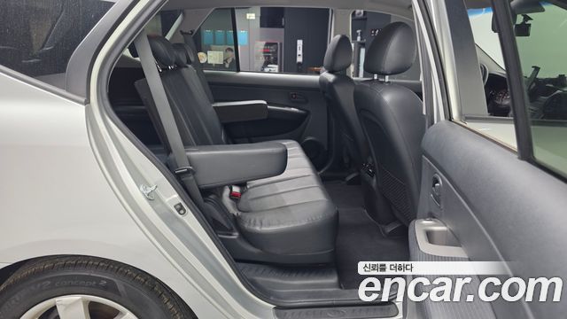 Kia Carens 2009 — photo 12