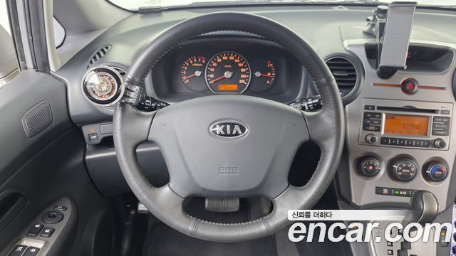 Kia Carens 2009 — photo 13