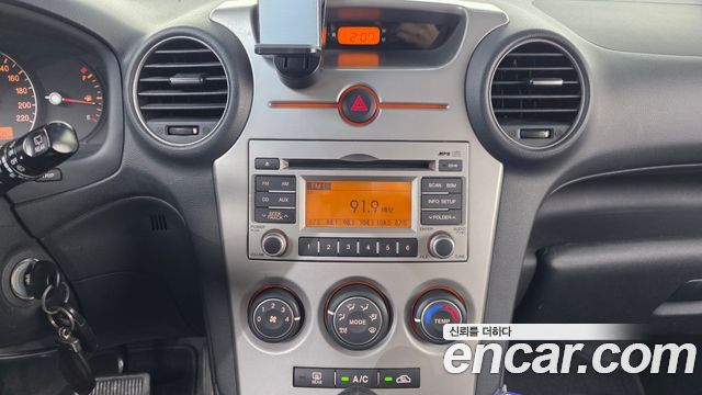Kia Carens 2009 — photo 14