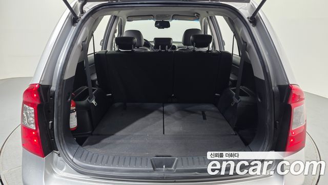 Kia Carens 2009 — photo 20