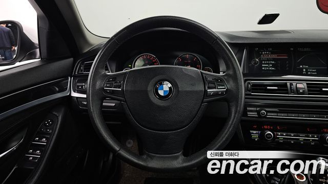 BMW 5-Series 2014 — photo 13