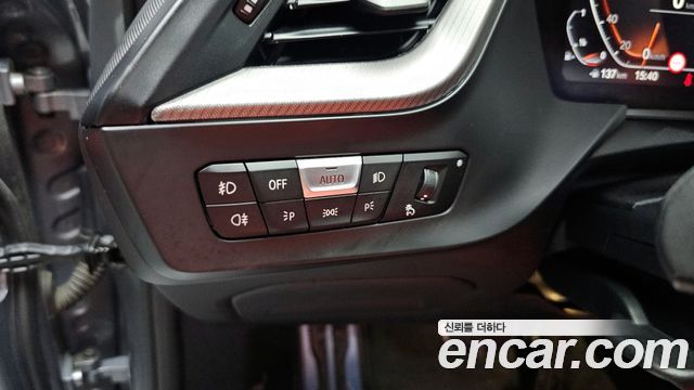 BMW 1-Series 2022 — photo 28