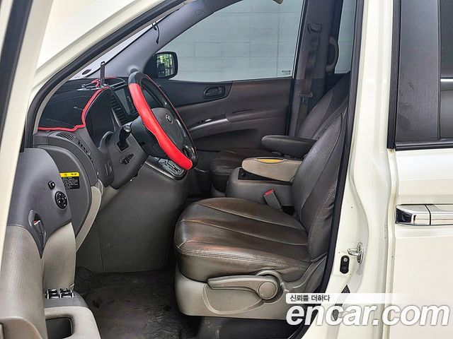 Kia Canival 2014 — photo 10