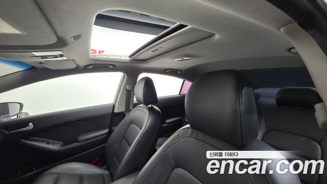 Kia K3 2014 — photo 17
