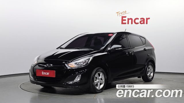 Hyundai Accent 2012 — photo 1