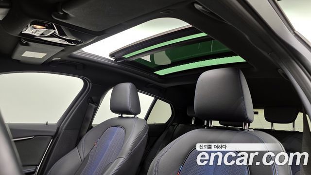 BMW 1-Series 2023 — photo 23
