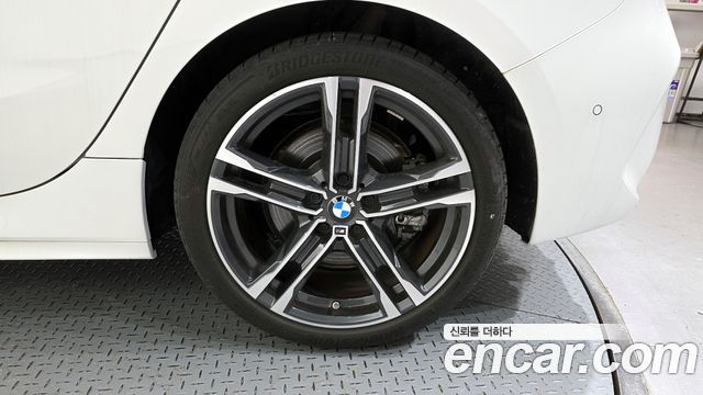 BMW 1-Series 2023 — photo 7