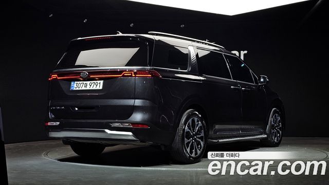 Kia Canival 2021 — photo 2
