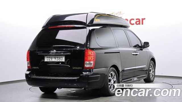 Kia Canival 2013 — photo 2