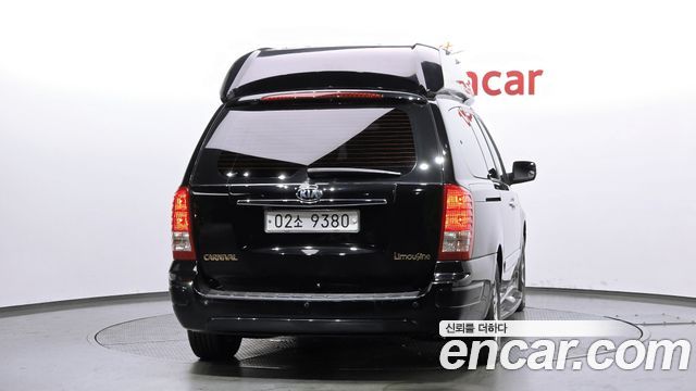 Kia Canival 2013 — photo 4