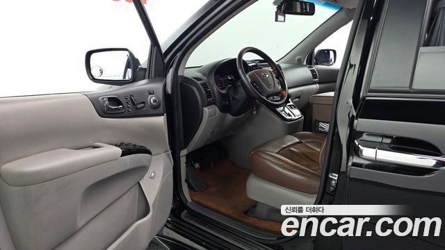 Kia Canival 2013 — photo 10