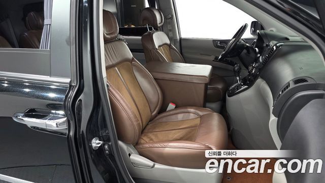 Kia Canival 2013 — photo 11