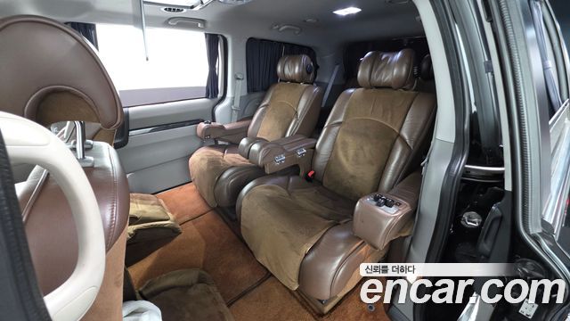 Kia Canival 2013 — photo 12