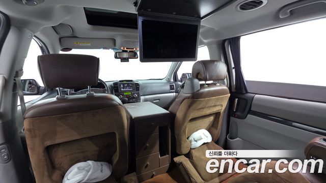 Kia Canival 2013 — photo 17