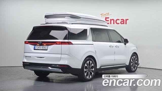 Kia Canival 2021 — photo 2