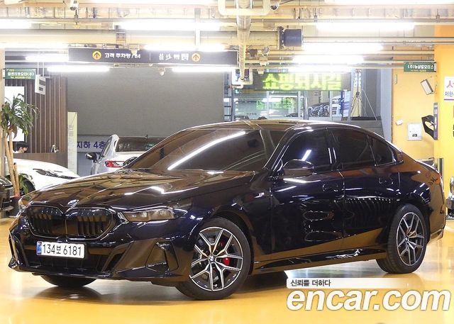 BMW 5-Series 2025 — photo 1