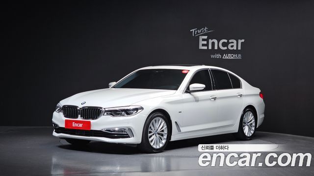 BMW 5-Series 2018 — photo 1