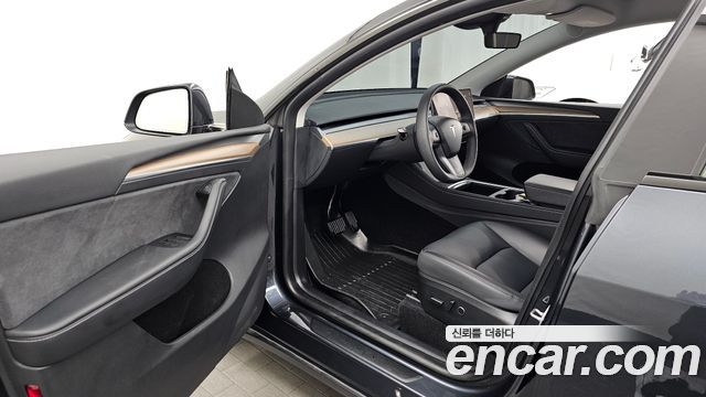 Tesla Model Y 2025 — photo 10