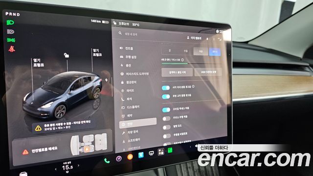 Tesla Model Y 2025 — photo 16
