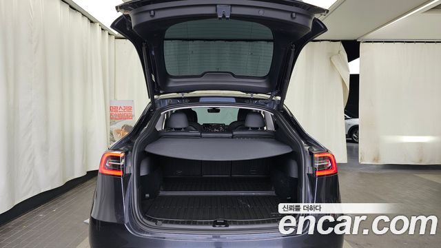 Tesla Model Y 2025 — photo 20