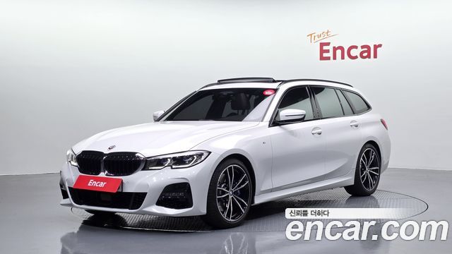 BMW 3-Series 2022 — photo 1