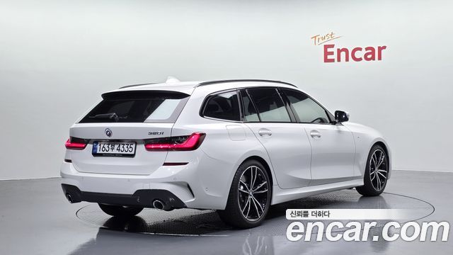 BMW 3-Series 2022 — photo 2