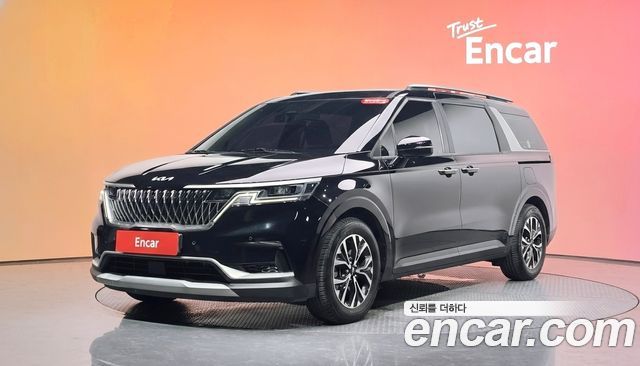 Kia Canival 2023 — photo 1