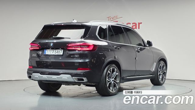 BMW X5 2023 — photo 2